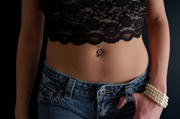 This photo of a girl wearing a belly ring - a current favorite for displaying body jewelry -  was taken by Scott Snyder of Lubbock, Texas.